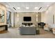 Modern lounge with stylish seating, a large TV, and a sleek piano at 285 Centennial Olympic Park Nw Dr # 809, Atlanta, GA 30313