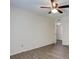 Minimalist bedroom with wood-look vinyl floors and neutral color scheme at 6851 Roswell Rd # G20, Sandy Springs, GA 30328