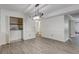 Dining area with hardwood floors, decorative light fixture and washer/dryer at 6851 Roswell Rd # G20, Sandy Springs, GA 30328