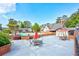 Community outdoor pool area with tables and chairs, perfect for relaxation and entertainment at 6851 Roswell Rd # G20, Sandy Springs, GA 30328