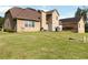Large yard view showcasing house, patio, grill, deck, and open green space at 739 E Mays E Rd, Stockbridge, GA 30281