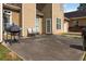 View of backyard with patio, grill, and chairs, perfect for outdoor entertaining at 739 E Mays E Rd, Stockbridge, GA 30281