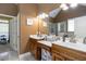 Primary bathroom with double sink vanity, tiled shower, and soaking tub at 739 E Mays E Rd, Stockbridge, GA 30281