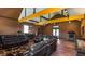 Entertaining game room includes a projector and comfortable seating with shuffleboard and pool table at 739 E Mays E Rd, Stockbridge, GA 30281