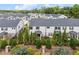 A well-maintained townhouse community surrounded by lush greenery and offering a serene living environment at 1399 Flathead River Ln, Marietta, GA 30064