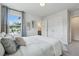 Comfortable bedroom offering natural light and convenient access to the bathroom at 1399 Flathead River Ln, Marietta, GA 30064