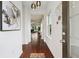 Inviting entryway with wood floors and a modern light fixture at 1399 Flathead River Ln, Marietta, GA 30064