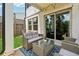 Charming patio with a comfortable seating area, stylish rug, and a view to the well maintained lawn at 1399 Flathead River Ln, Marietta, GA 30064