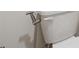 Modern toilet with a bidet sprayer, offering convenience and hygiene at 1399 Flathead River Ln, Marietta, GA 30064