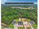 Aerial view with property lines shows the home's location with surrounding greenery and neighboring houses at 3061 Bold Springs Rd, Dacula, GA 30019