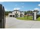 Stunning two-story home features a gated entrance, three-car garage and lush landscaping at 3061 Bold Springs Rd, Dacula, GA 30019