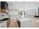 Spacious kitchen with a large island, modern finishes, and stainless steel appliances at 3061 Bold Springs Rd, Dacula, GA 30019