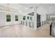 Bright living space featuring hardwood floors, recessed lighting, and windows with views into the exterior at 3061 Bold Springs Rd, Dacula, GA 30019