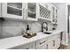 Close up of Wet Bar area including wine storage and cooler at 3061 Bold Springs Rd, Dacula, GA 30019
