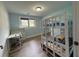 Cozy bedroom with bunk beds, desk, and a view to the neighborhood at 453 James Street Sw, Lilburn, GA 30047