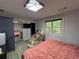 Cozy bedroom with a massage chair and view from a single window, features modern decor at 453 James Street Sw, Lilburn, GA 30047