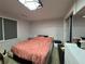 Bedroom featuring light walls and natural light coming through the windows at 453 James Street Sw, Lilburn, GA 30047