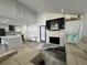 Beautiful open concept living area and stylish fireplace at 453 James Street Sw, Lilburn, GA 30047