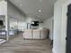 Bright living room featuring an open concept and modern furnishings at 453 James Street Sw, Lilburn, GA 30047