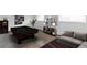 Bright game room featuring a pool table, cozy seating, and shelving units for storage at 1213 Camelot Dr, Atlanta, GA 30349