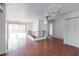Bright living area with wood floors, a chandelier, and sliding glass doors at 1213 Camelot Dr, Atlanta, GA 30349