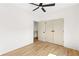 Clean bedroom design with hardwood floors, neutral walls, and a ceiling fan for comfort at 1238 Memorial Se Dr # A, Atlanta, GA 30316