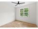 Bright bedroom featuring hardwood floors, large window offering natural light and views at 1238 Memorial Se Dr # A, Atlanta, GA 30316