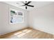 Bright bedroom featuring hardwood floors, large window offering natural light and views at 1238 Memorial Se Dr # A, Atlanta, GA 30316