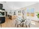 Bright and open floorplan featuring a dining room with hardwood flooring and modern lighting at 1238 Memorial Se Dr # A, Atlanta, GA 30316