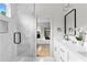 Spa-like main bath featuring marble tile, double vanity, glass shower and backyard view at 1238 Memorial Se Dr # A, Atlanta, GA 30316