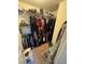 Walk in closet with wire shelving racks for organized clothing storage at 1346 Pilgrim Lake Dr, Cumming, GA 30040