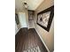 Inviting entryway featuring wood flooring and decorative wall art at 1346 Pilgrim Lake Dr, Cumming, GA 30040
