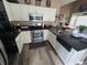 Well-equipped kitchen with stainless steel appliances and ample counter space at 1346 Pilgrim Lake Dr, Cumming, GA 30040
