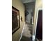Carpeted staircase with railing leading upstairs, decorated with wall art at 1346 Pilgrim Lake Dr, Cumming, GA 30040