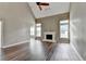 Living room with vaulted ceiling, fireplace and plenty of natural light at 5036 Weatherstone Drive, Buford, GA 30519