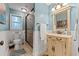 Stylish bathroom with shower, vanity, and toilet, providing a serene and functional space at 610 Lake Dr, Snellville, GA 30039