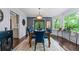 Dining room with hardwood floors and natural light at 610 Lake Dr, Snellville, GA 30039