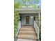 Inviting front entrance with stained glass at 610 Lake Dr, Snellville, GA 30039