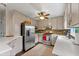 Modern kitchen featuring stainless steel appliances, white countertops, and mosaic backsplash at 610 Lake Dr, Snellville, GA 30039