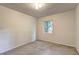 This bedroom has white walls and a window letting in natural light at 1400 Chalmette Ne Dr # 2, Atlanta, GA 30306
