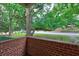 Brick retaining wall with a nice green grass and landscaping at 1400 Chalmette Ne Dr # 2, Atlanta, GA 30306