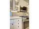 Kitchen with stainless steel stove and microwave features glass cabinets at 1400 Chalmette Ne Dr # 2, Atlanta, GA 30306