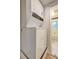 A laundry room features a stacked washer and dryer at 1400 Chalmette Ne Dr # 2, Atlanta, GA 30306