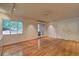 Open-concept living room with hardwood floors and plenty of natural light at 1400 Chalmette Ne Dr # 2, Atlanta, GA 30306