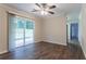 Bright dining area featuring a sliding glass door and hardwood floors at 1496 Indian Forest Ct, Stone Mountain, GA 30083