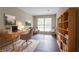Bright home office with modern desk, bookshelf, and comfortable seating at 1496 Indian Forest Ct, Stone Mountain, GA 30083