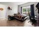 Bedroom featuring gray walls, a large window, and wood-look floors at 2730 Samples Rd, Cumming, GA 30041