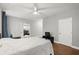 Large bedroom with connecting bathroom and views into the home's other living areas at 2730 Samples Rd, Cumming, GA 30041