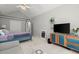 Bedroom featuring neutral walls, vaulted ceilings, and a nice storage cabinet at 2730 Samples Rd, Cumming, GA 30041