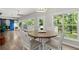 Charming dining area with natural light and hardwood flooring at 2730 Samples Rd, Cumming, GA 30041